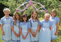 Maypole dancers put spring in fair's step