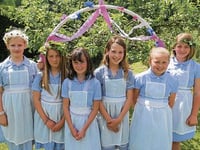 Maypole dancers put spring in fair's step