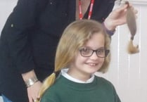 Caring Maddison lops her long locks for charity