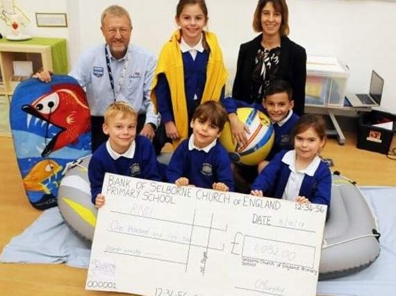Pupils buoyant after RNLI cheque handover