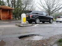 Councils face funding cuts over pothole repairs