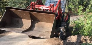 VIDEO: Watch the moment a tractor driver runs down his neighbour in a Churt country lane