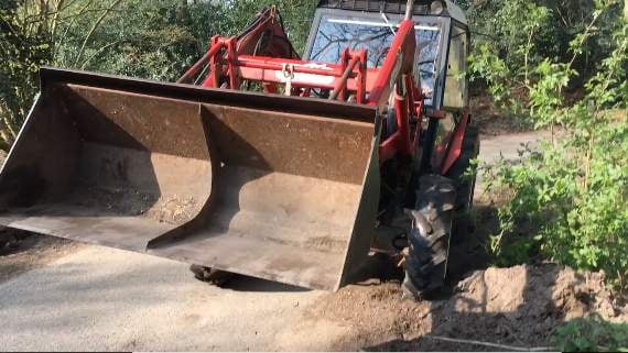 VIDEO: Watch the moment a tractor driver runs down his neighbour in a Churt country lane