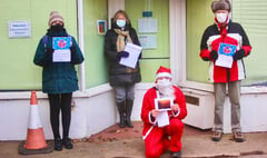 Santa turns campaigner at South West Surrey MP's office