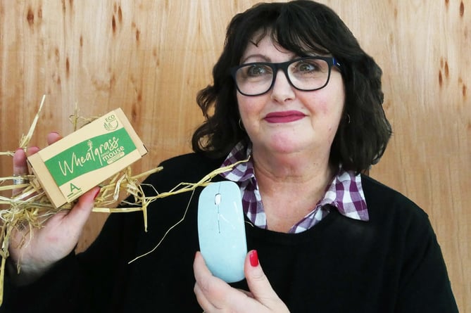Ceratech Accuratus sales director Angela Lennox shows off the Kingsley company’s biodegradable wheat grass computer mouse