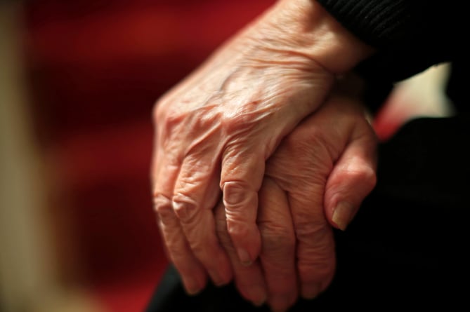 The hands of an elderly woman