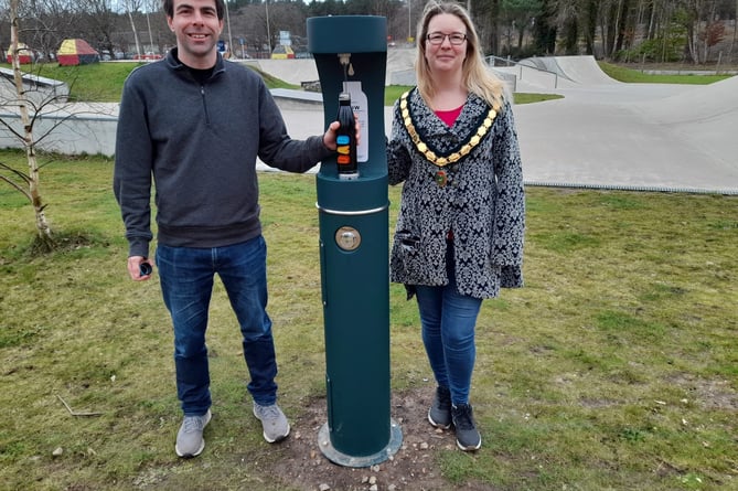 Whitehill Town Council leader Cllr Andy Tree and Deputy Town Mayor Cllr Catherine Clark open the water bottle filling station at Bordon skatepark on February 8, 2021.