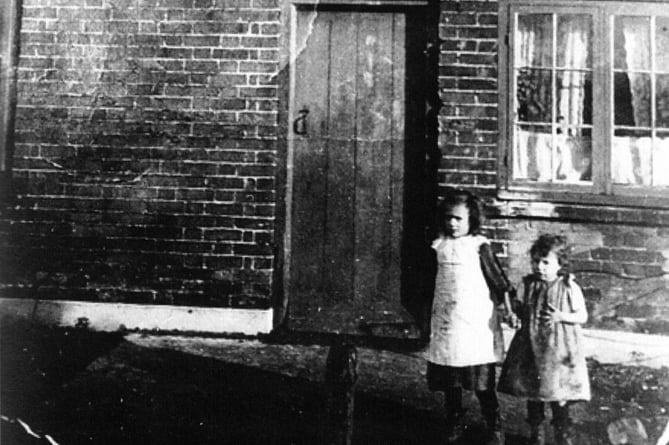 Two of William Crumplin’s sisters appear in this photo outside the house in about 1914. Ellen (Nellie) is on the right with Dorothy (Eddie).