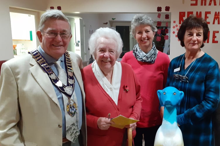 Left to right: Former Haslemere mayor Cllr John Robini with Dr Hunter, Anne Downing, the chairman of The Hunter Centre, and Margaret Barlow, a trustee of the centre