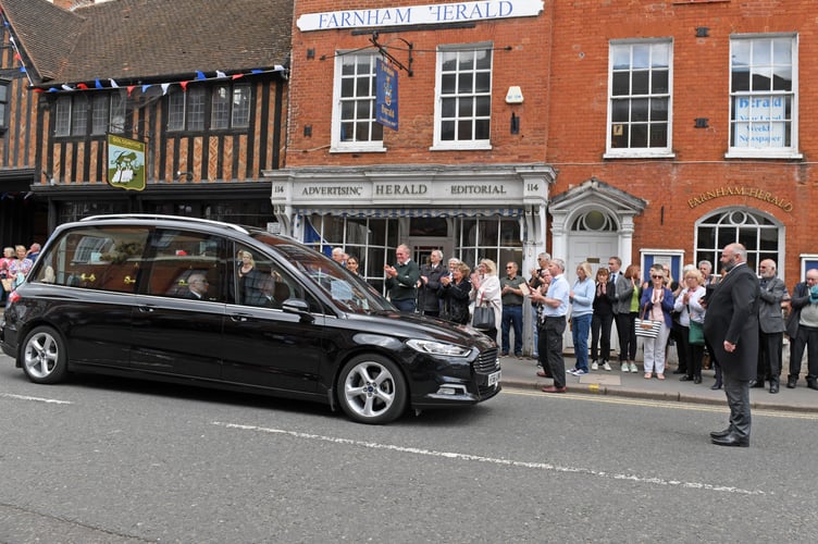 FUNERAL SIR RAY TINDLE        MRW          12th May 2022
Sir Ray Tindle’s hearse pauses outside the Herald offices in West Street on its way to St Andrew’s Church

The funeral cortege of Sir Ray Tindle CBE DL passes the office of The Farnham Herald as it made its way to St Andrew's Church Farnham for a Private Family Service  


Picture:  Malcolm Wells 
Professional Photographer 
