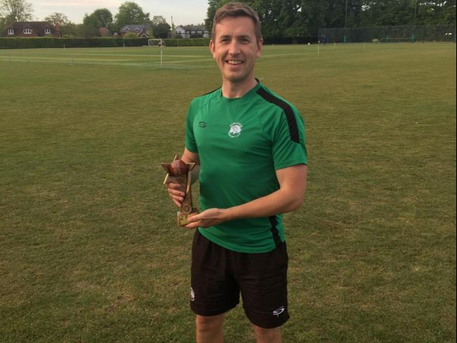 Richard Forbes with the Rowledge man-of-the-match trophy sponsored by The Sandrock pub and takeaway