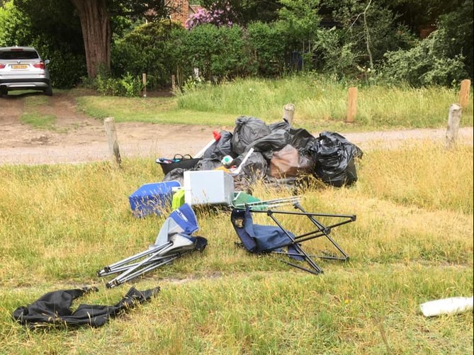 Some of the rubbish left after a traveller encampment vacated Shortfield Common, Frensham, on Saturday