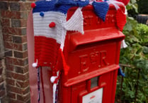 Knitted Queen looks after Selborne postbox for Platinum Jubilee