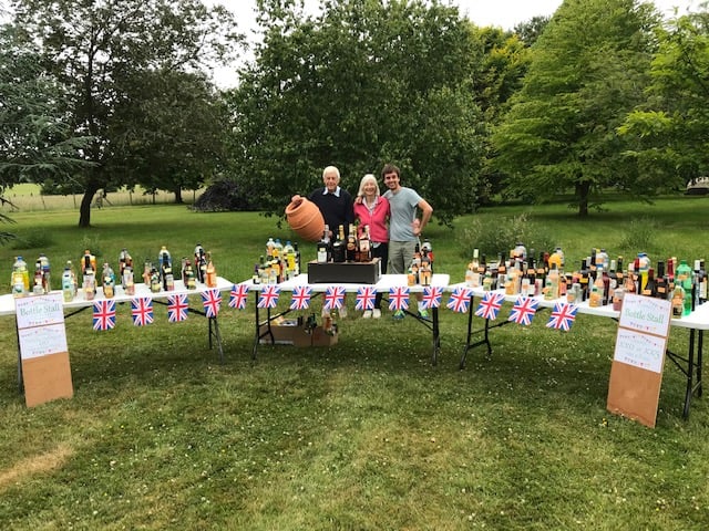 The Platinum Jubilee-decorated bottle stall at the Shalden village fete, Shalden Park House, June 19th 2022.