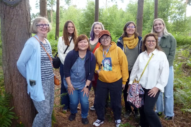 The 2022 Heathland Artworks artists at Farnham Heath. From left: Geraldine Lewis, Robyn Jacobs, Betty Lau, Stef Will, Yunxuan Shi, Valerie Mclean, Ali Jarvis and Lottie Andrews.