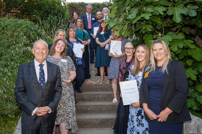 Gyles Brandreth, left, and Cllr Roz Chadd, right, with award recipients and nominees at Hampshire County Council’s Education Awards 2022.