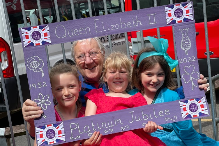 Capturing a memory in a Platinum Jubilee photo frame at St Mary’s Bentworth CE Primary School.