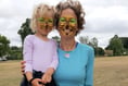 Face painter adds smiles to party for environment in Alton