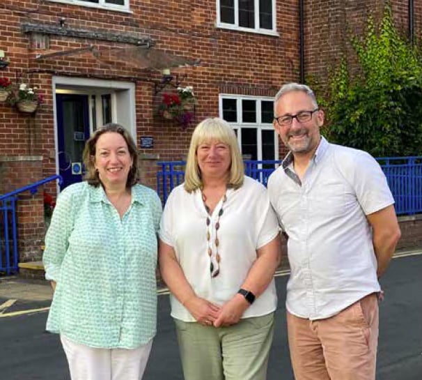From left: Chair of trustees Lorna Vickery, retiring governor Jacky Wilde and headteacher Steve Mann at Amery Hill School in Alton, July 2022.