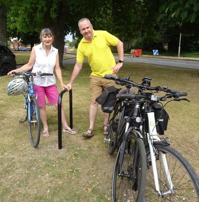 Chris Chappell and Cllr Richard Platt by the bike stands at The Butts in Alton, August 2022.