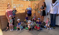 Mayor visits Bordon nursery to reward its young gardeners  