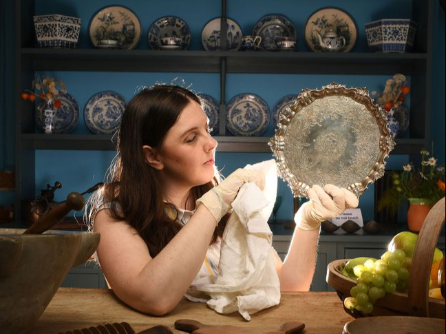 Serving Time: Collections manager Kimberley James polishes the newly acquisitioned silver tray owned by Gilbert White's paternal Grandmother Rebecca Luckin who lived at The Wakes, in Selborne with the renowned 18th century ecologist and his family until her death in 1755. 
 The tray bearing the engraved family crest, which would have been part of the decor of the Hampshire home and very familiar to Gilbert White throughout his life has been restored to the collection after a two hundred and fifty year absence.Â©Russell Sach - 0771 882 6138
