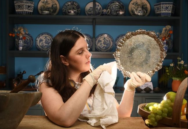 Serving Time: Collections manager Kimberley James polishes the newly acquisitioned silver tray owned by Gilbert White's paternal Grandmother Rebecca Luckin who lived at The Wakes, in Selborne with the renowned 18th century ecologist and his family until her death in 1755.  The tray bearing the engraved family crest, which would have been part of the decor of the Hampshire home and very familiar to Gilbert White throughout his life has been restored to the collection after a two hundred and fifty year absence.Â©Russell Sach - 0771 882 6138