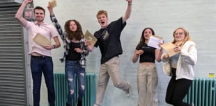 Amery Hill School staff and trustees congratulate GCSE pupils