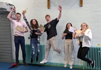 Amery Hill School staff and trustees congratulate GCSE pupils