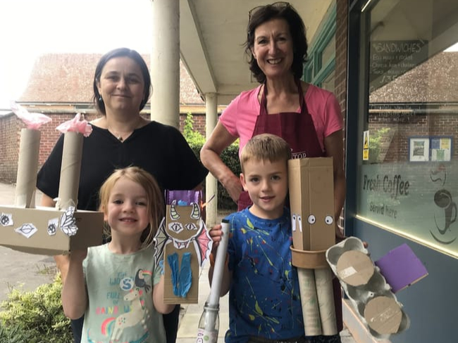 Volunteers Sarah Brown and Annie Pritchard with Bella Rose and brother Henry