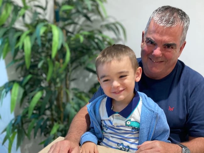 Mark Nunn with his grandson Alfie, six, enjoying the train set