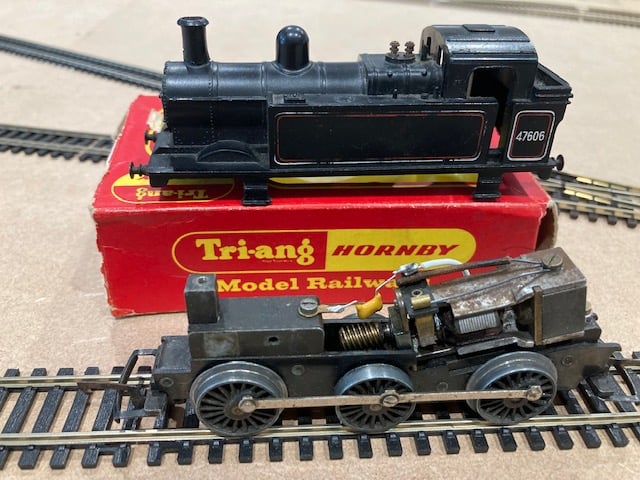 Farnham man Mark Nunn’s Triang R52 Jinty class tank locomotive and a Royal Mail carriage set, brought back to life by Farnham Repair Cafe
