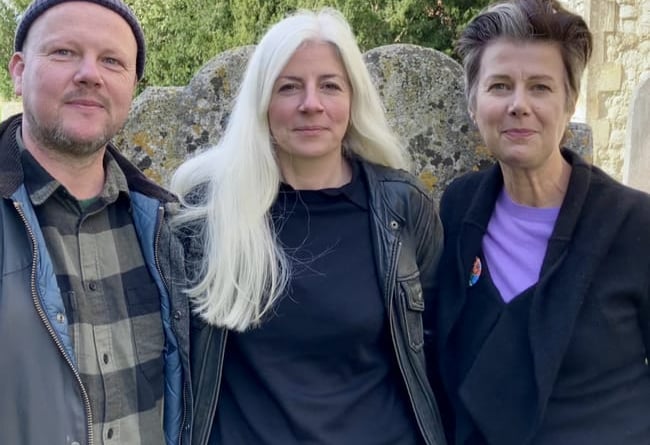 F for Farnham creators Simon Aeppli, Sophie Austin and Roz Mortimer outside St Andrew’s Church