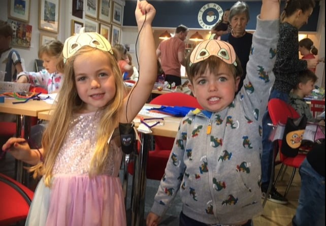 Twins Violet and Arthur Berry show off their crafts at the Fernhurst Hub’s Hallowe’en event