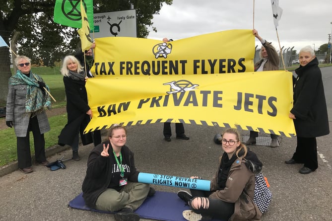 Scientists and youth campaigners blocked an entrance to Farnborough Airport on Thursday, November 10 to demand the end to the 'obscene, polluting use of private jets', as part of the new 'Make Them Pay' global campaign