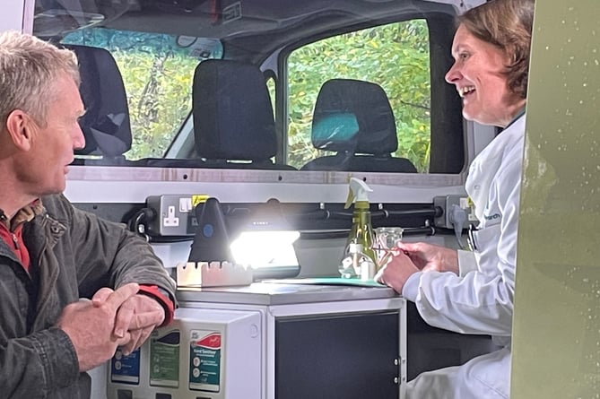 Countryfile presenter Tom Heap and Caroline Gorton from Forest Research in the mobile laboratory