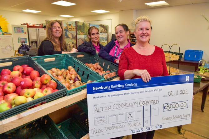 02.11.22 - Alton, UK.Newbury Building Society presenting a cheque for Â£3000 to Alton Community Cupboard. From left are Clare Taylor, Cassie Newnham, Lauren Dearlove with Sandy Marks from Alton Community Cupboard.Photo: Professional Images/@ProfImages
