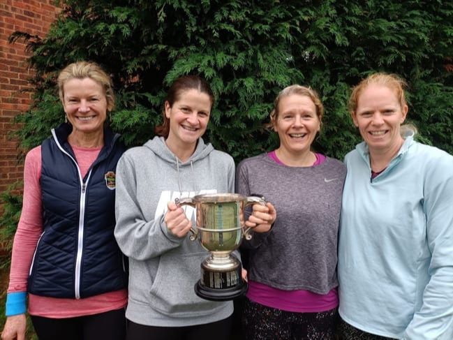 Holding the ladies’ Premier Division trophy are Caroline Weaver, Catherine Mckeracher, Victoria Brown and Jackie West