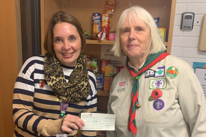 Emma Ross with Sue Howe from the 8th Alton Scout Group at the Alton College foodbank, November 2022.