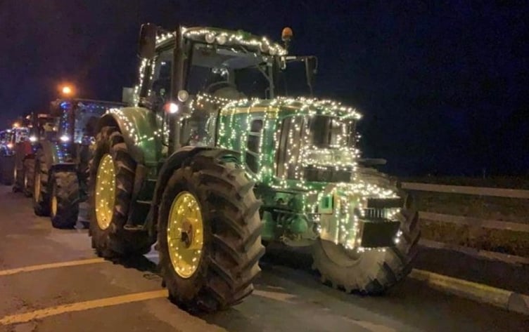 generic xmas light decorated tractor