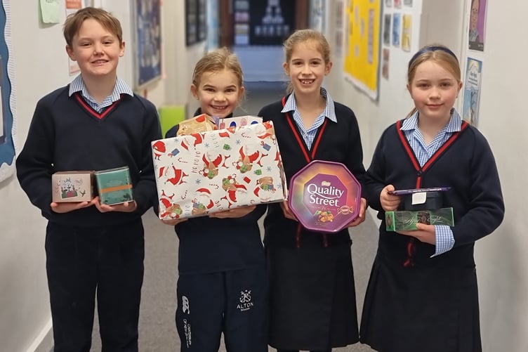 Alton School pupils donate Christmas presents to Alton Lions, December 2022.