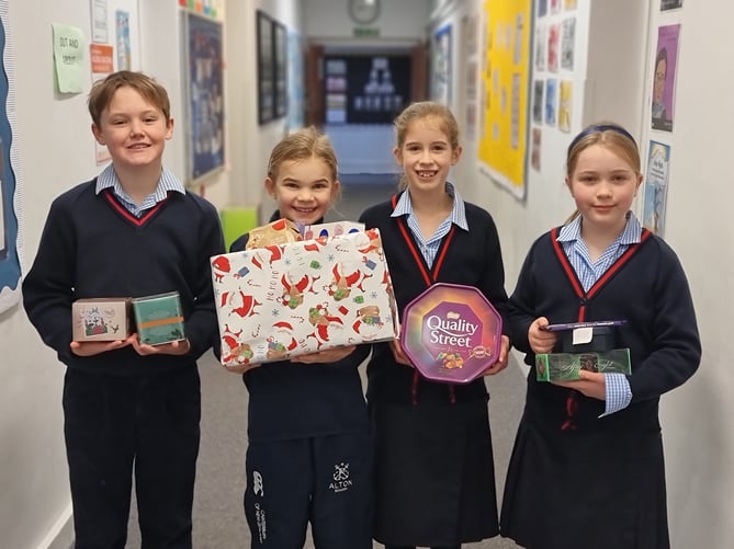 Alton School pupils donate Christmas presents to Alton Lions, December 2022. 