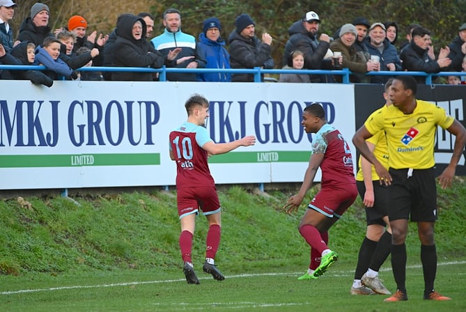Owen Dean is congratulated by Ange Djadja