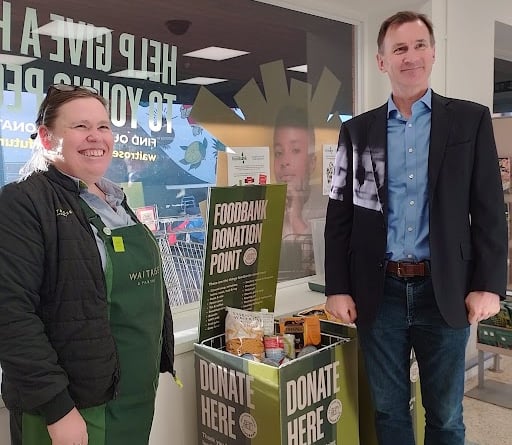 Alice Butcher, partner and community lead at Waitrose Farnham, with Jeremy Hunt on the MP’s recent visit to the Lion & Lamb Yard supermarket