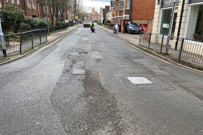 Gravel is currently strewn across the South Street/Union Road junction in Farnham town centre as a result of the road surface breaking up