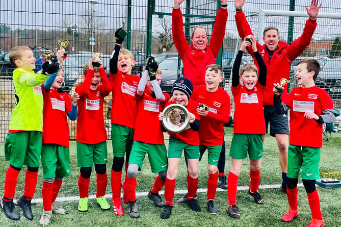 Chiddingfold Youth Chiefs under-tens celebrate winning the league plate