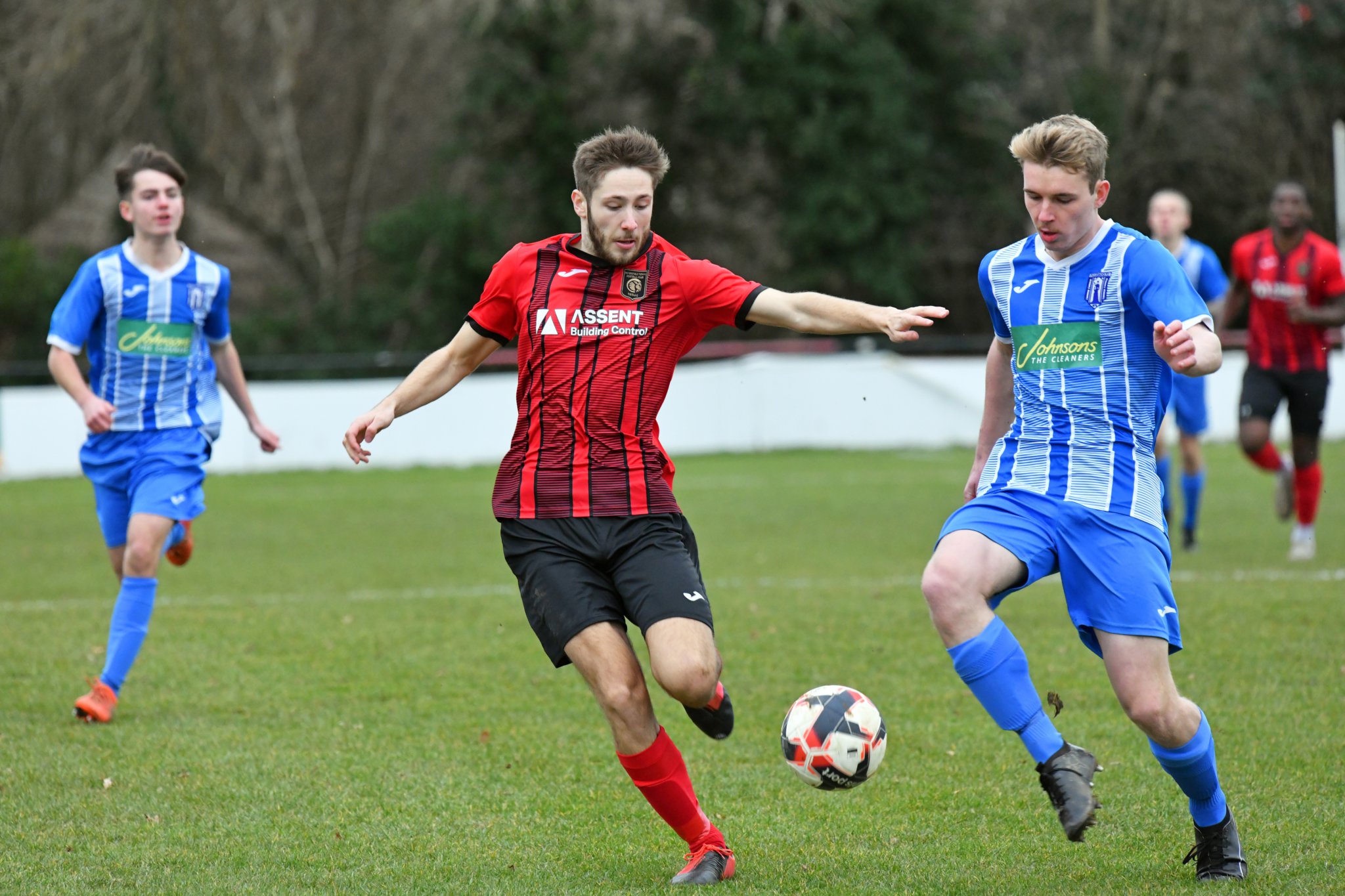 Petersfield’s Kieran Alcock competes for possession