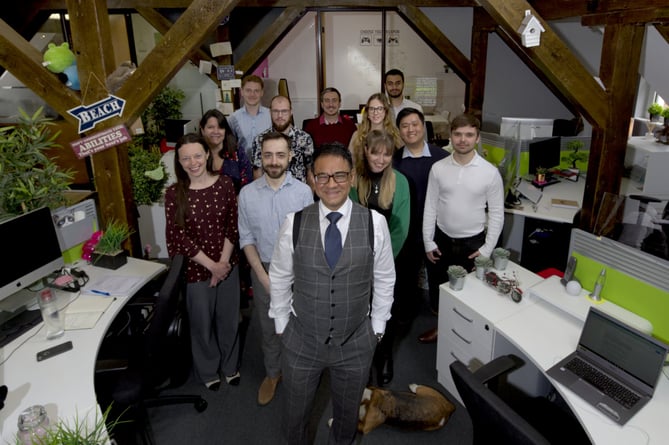 Managing director and founder Saybhan (centre) with Thunderbolt staff at its office in Victoria House, South Street, Farnham