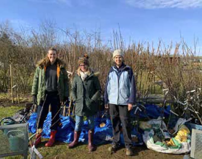 Petersfield Climate Action Network officers with fruit trees at Petersfield Community Gardens, February 11th 2023.