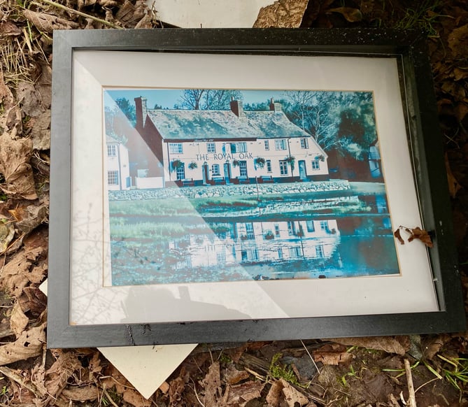 The fly-tipped waste included a number of personal items including this photo of The Royal Oak pub in Havant
